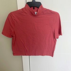 Pink short sleeved high neck crop top